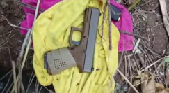 اللد: ضبط مسدس وذخيرة مخبأ بين الأشجار 